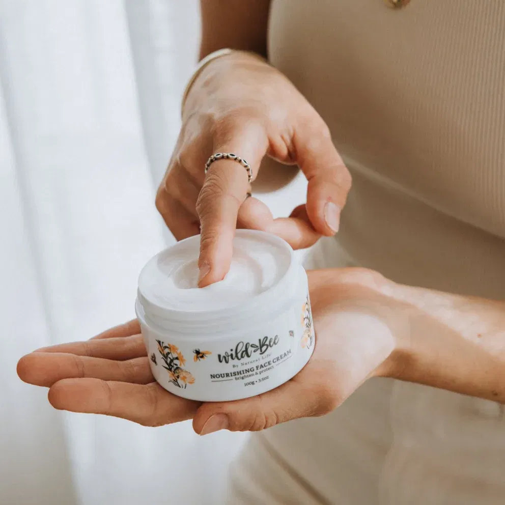 Wild Bee skincare made in Australia, photographed outdoors among native greenery