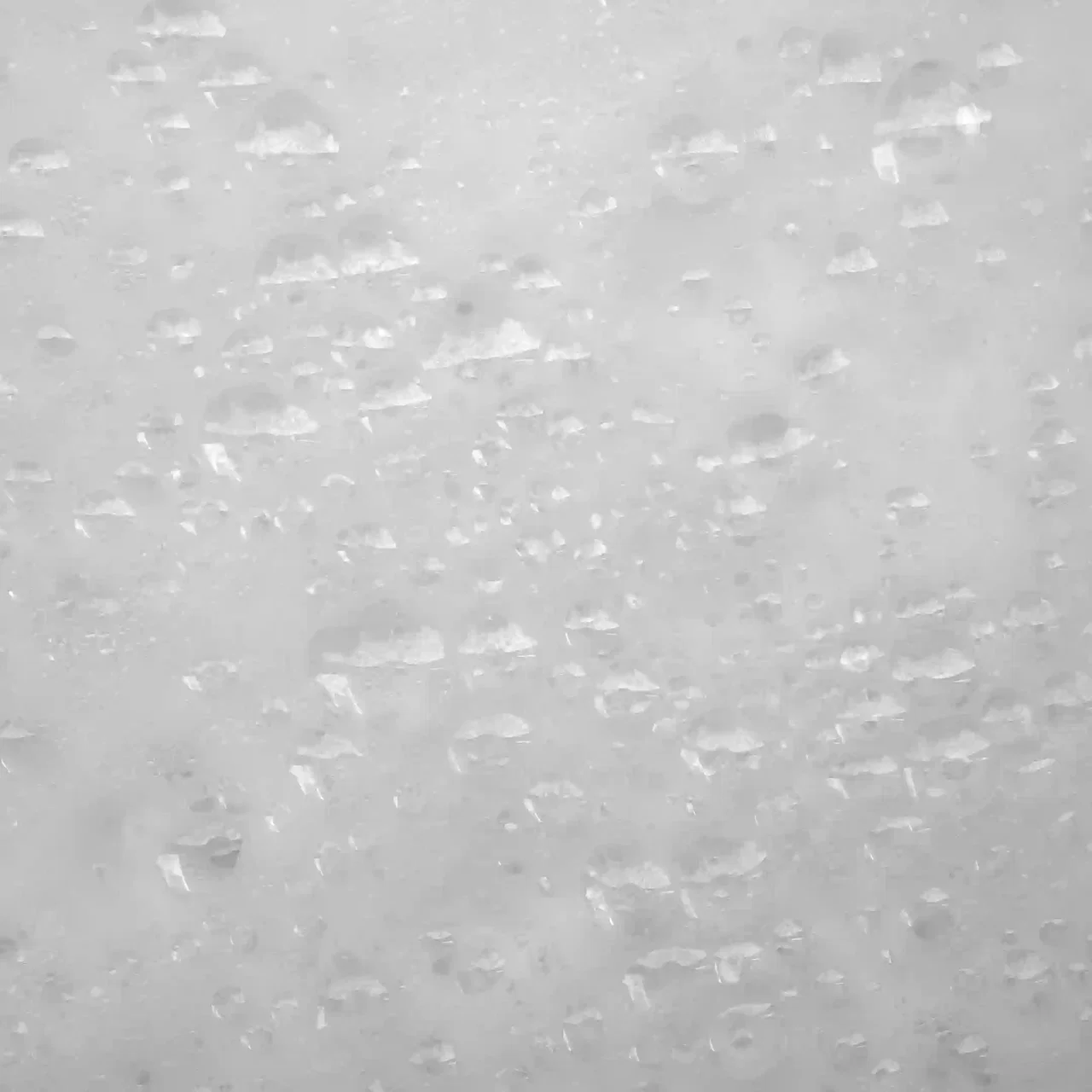 Acrylates copolymer: a close-up of translucent white granules in a pale gel.