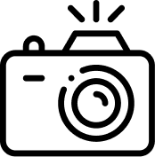 Icon of a camera with its flash firing