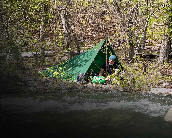 Safari tarp pitched on a trip