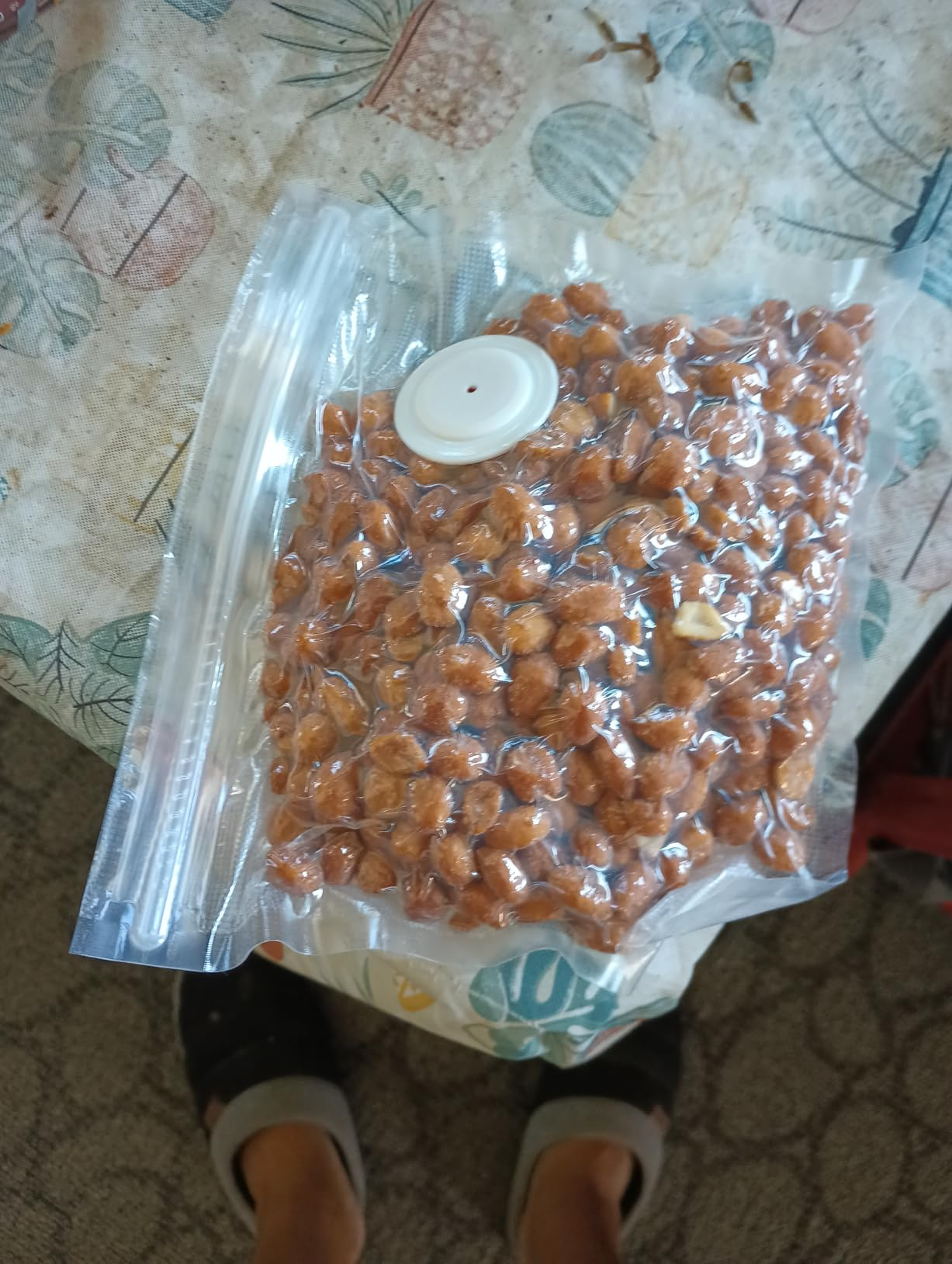 A bag of honey-roasted peanuts vacuum sealed tight