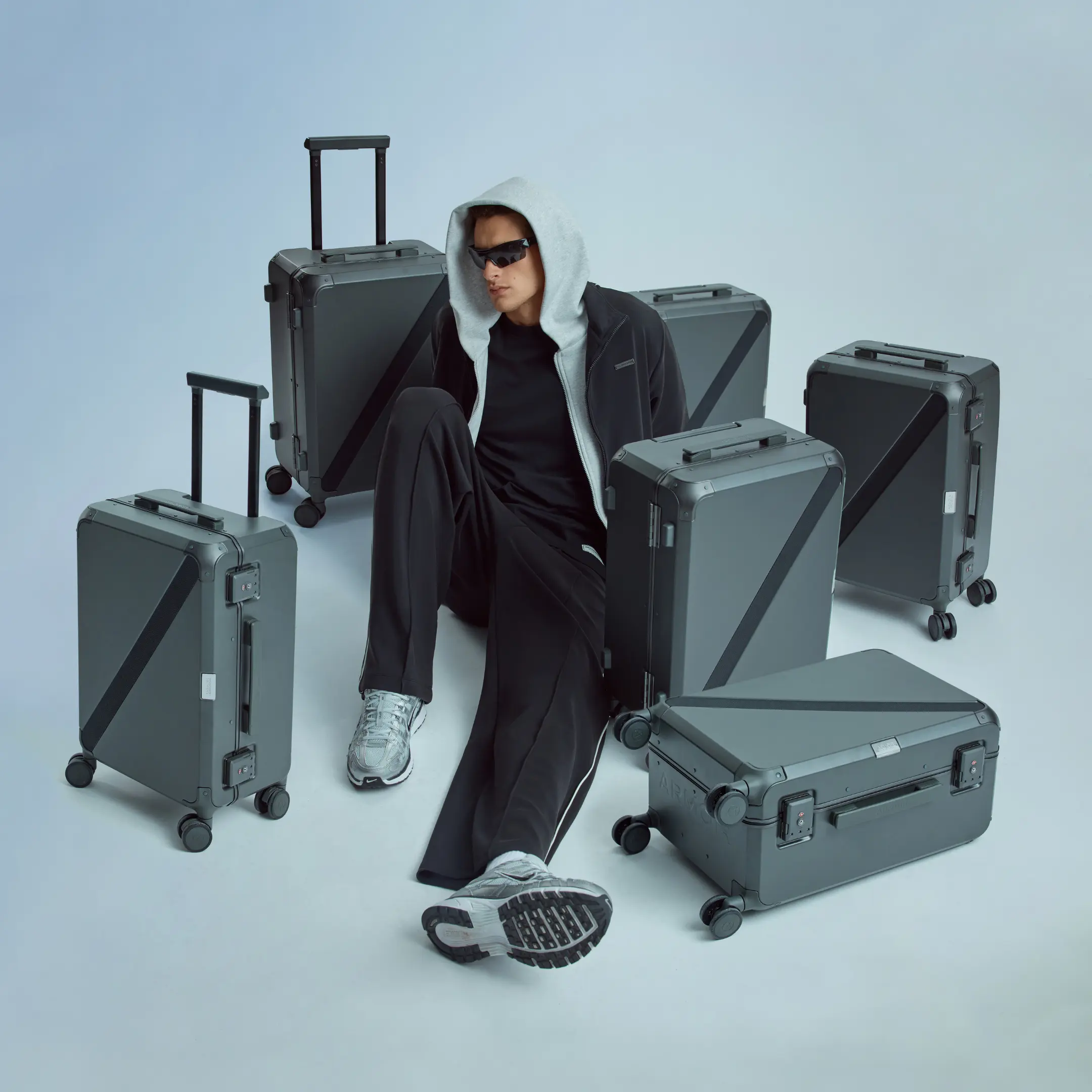 A group of ARMOIR Cabin and Large Trunks in anthracite and silver