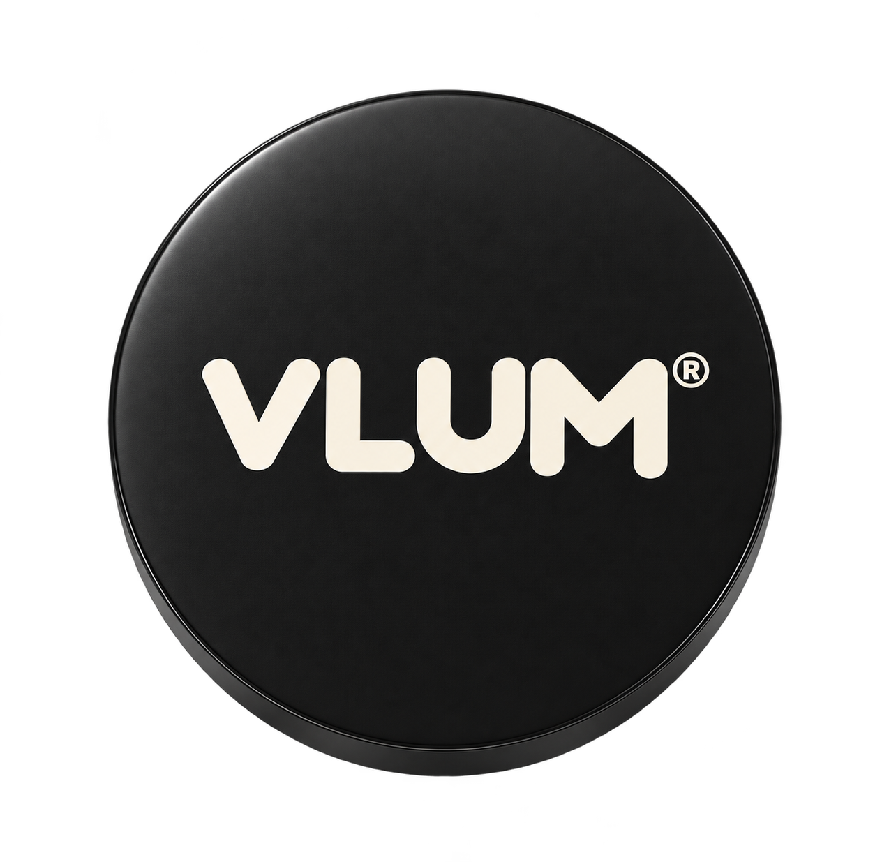 Hands pressing a puff into the VLUM compact