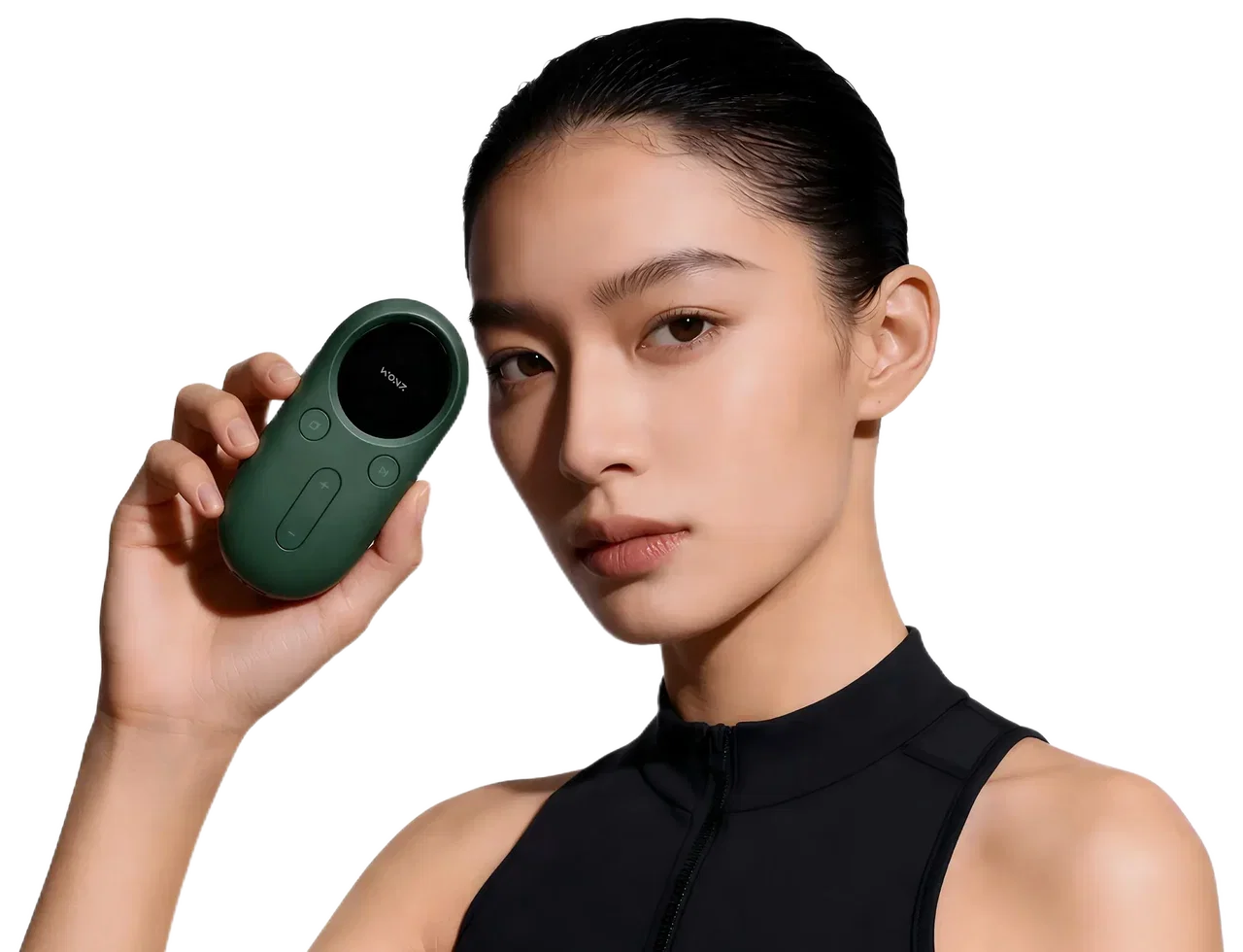 Model holding the green WONZ ta-VNS device
