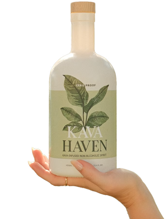 A hand balancing a bottle of KAVA HAVEN kava-infused non-alcoholic spirit on its open palm