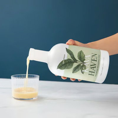 Kava Haven being poured neat into a ribbed glass
