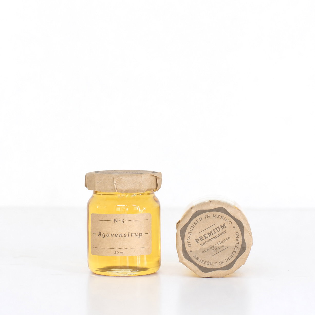 Glas Agavensirup Nº4 mit Deckel aus Kraftpapier