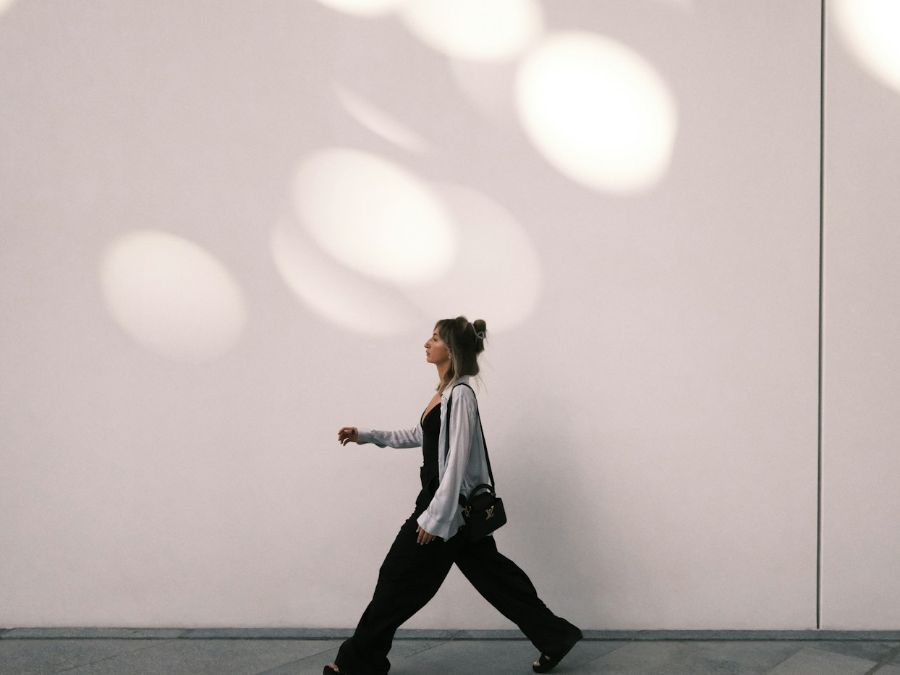 A woman walking alone, thinking