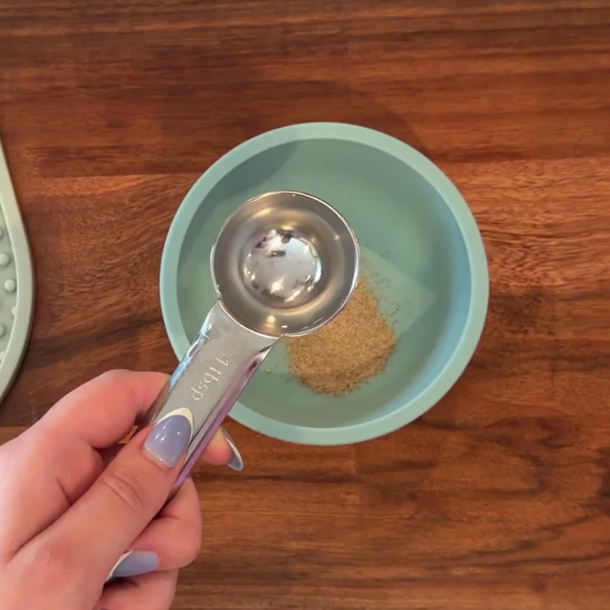 Pouring fresh water into the treat mix