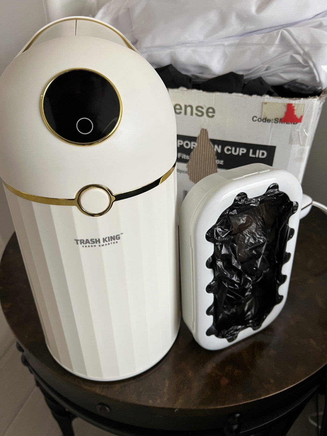 Crown 10L bin on a side table next to a sealed refill ring