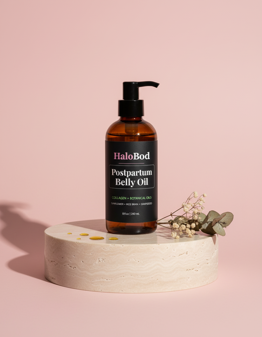 Postpartum Belly Oil bottle on a stone pedestal