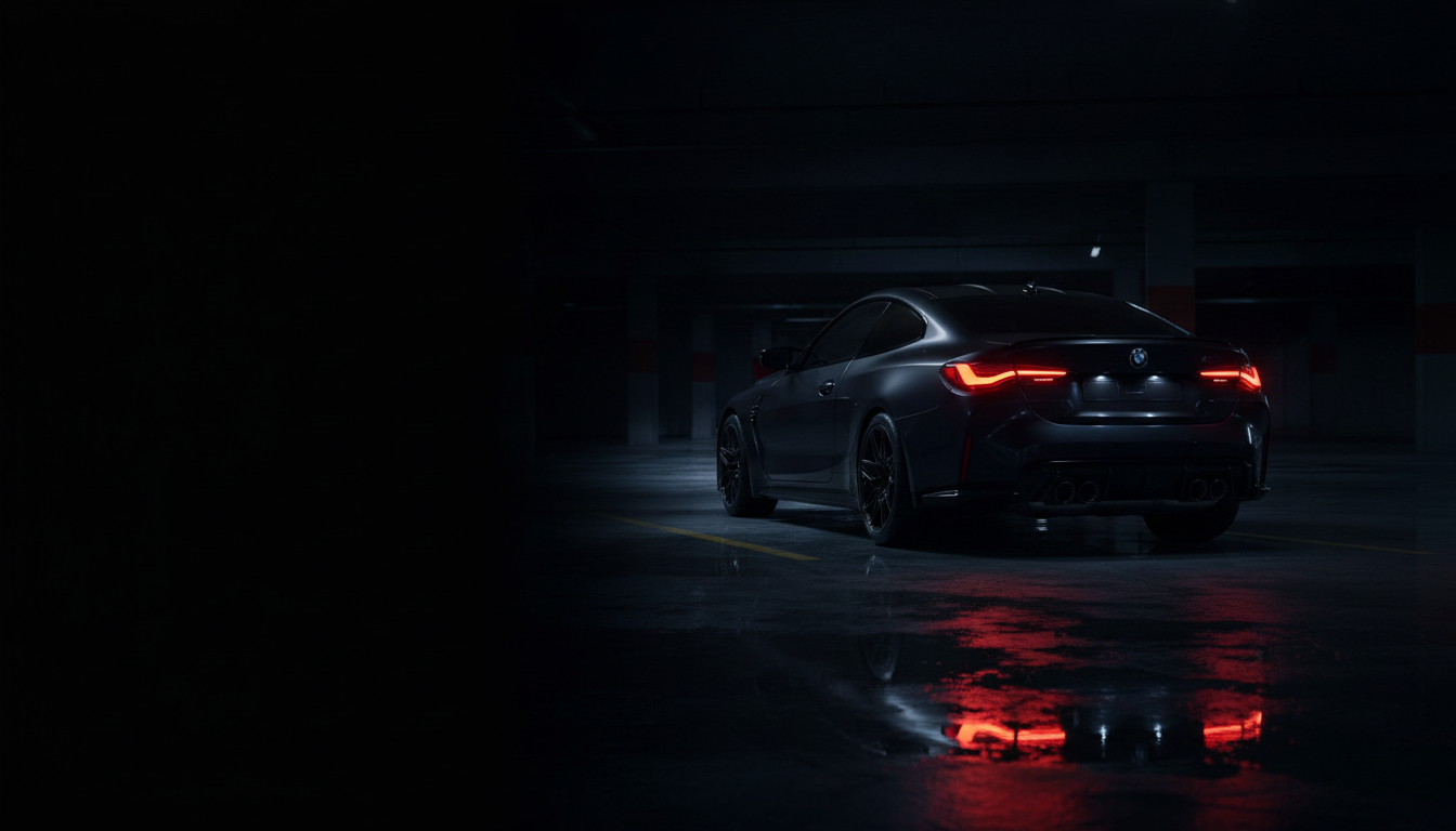 Black BMW M4 coupe with glowing red tail lights in a dark underground garage