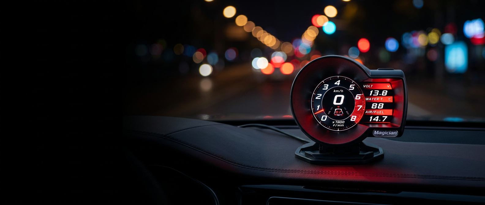 OBD LCD gauge glowing red on a car dashboard at night