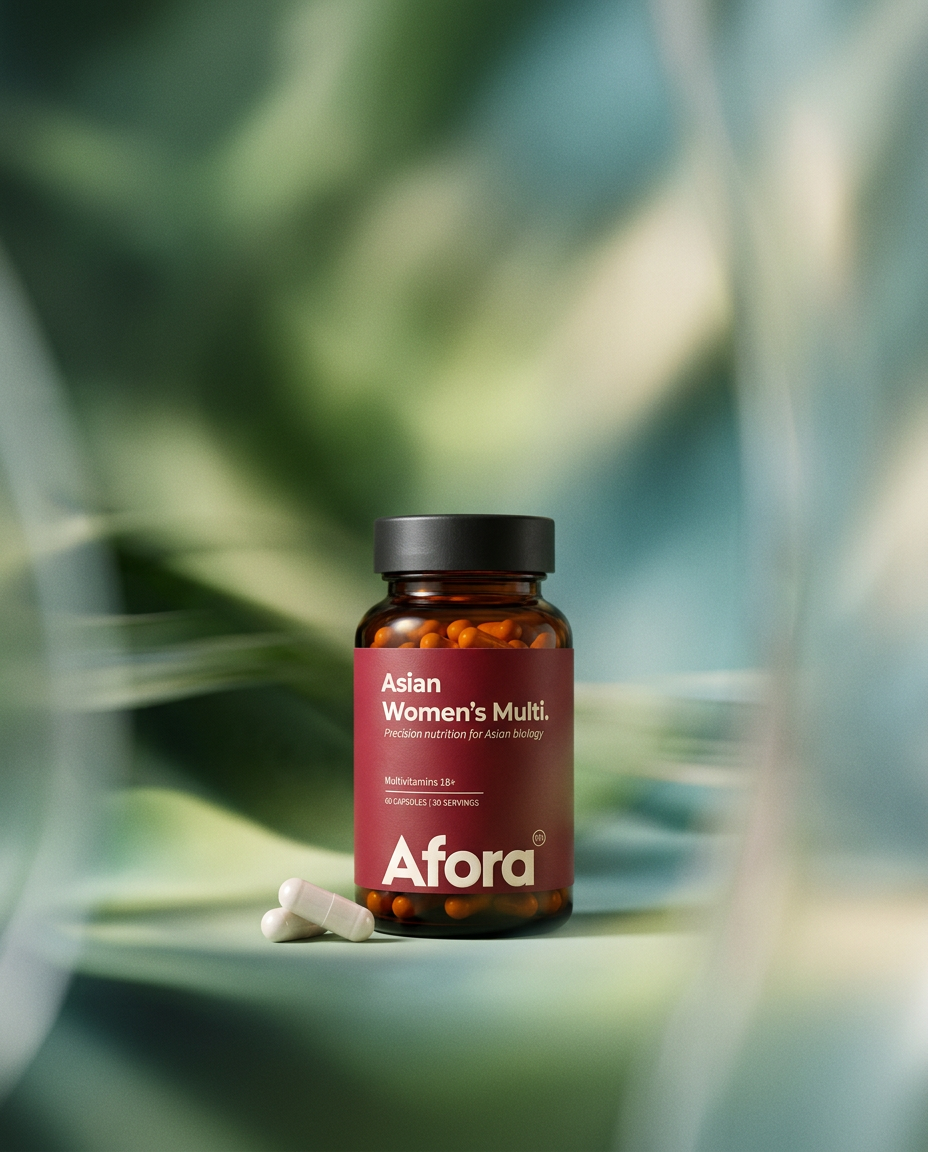Afora Asian Women's Multi bottle with two capsules, set against soft, blurred sage green and teal light