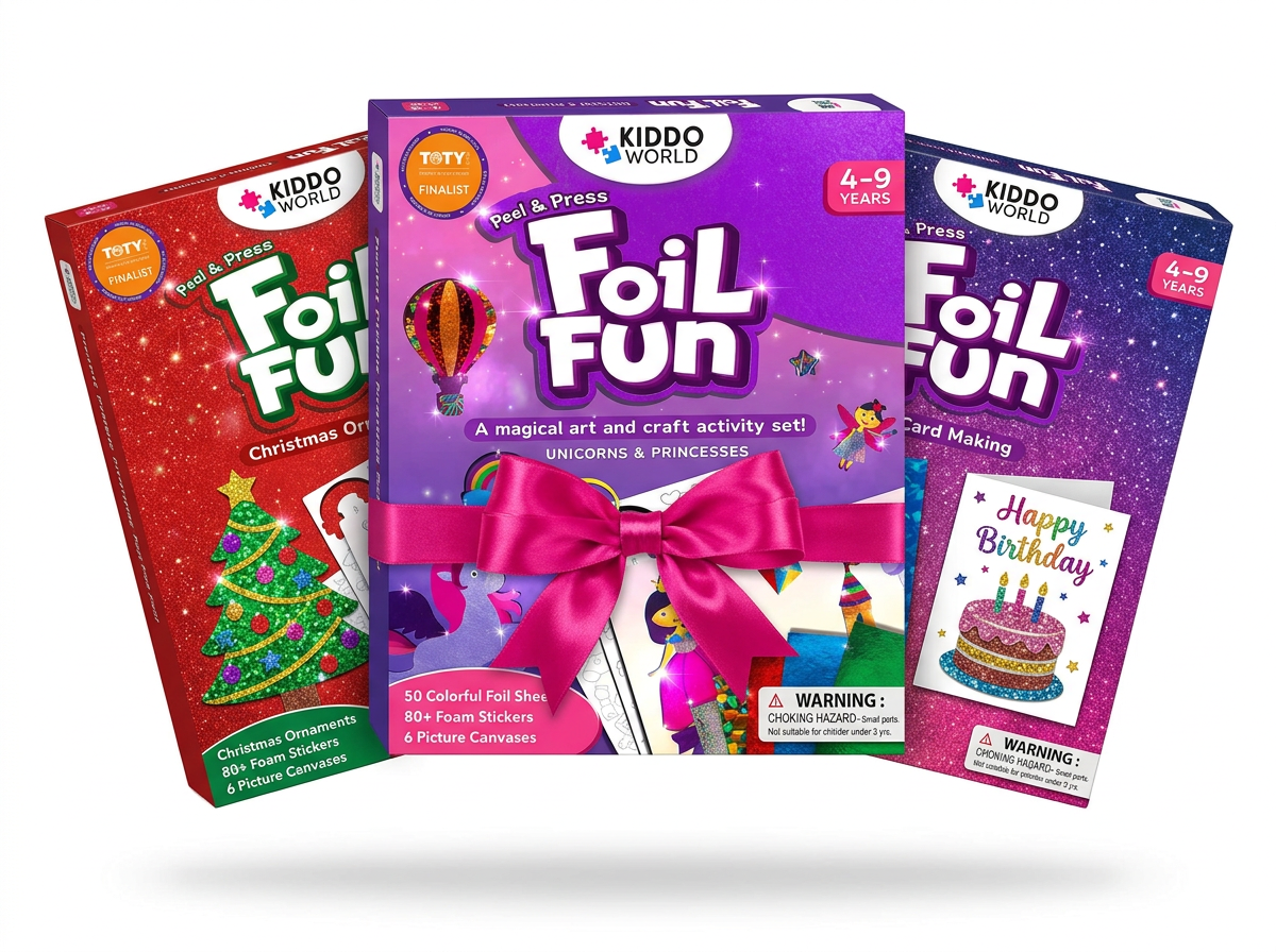 Tři sady Foil Fun svázané růžovou stuhou jako vánoční dárek