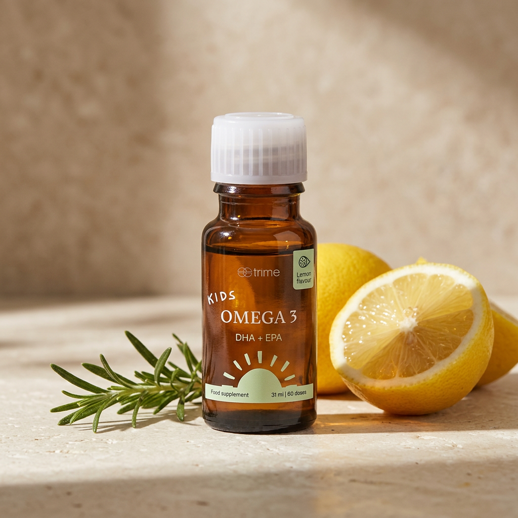 Kids Omega-3 bottle beside fresh lemon halves