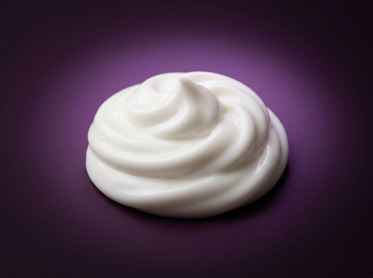 A swirl of white non-greasy lotion